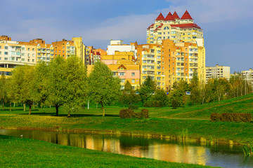 Fototapeta na wymiar Cityscape of Colorful Buildings and Park