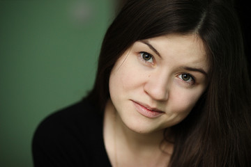 Portrait close up of young smiley beautiful woman