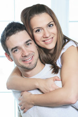 couple having great time close to the window