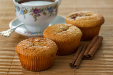 Still life with muffins and cinnamon