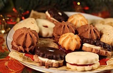 Several pieces of Christmas cookies on a plate