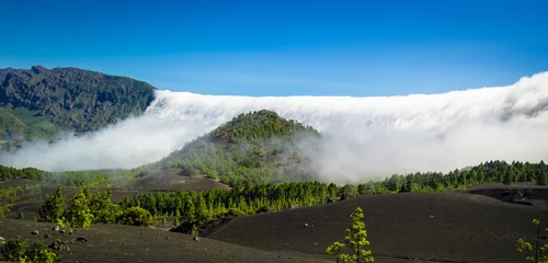Foto op Plexiglas "Waterfall" of clouds at La Palma, Canary Islands © Neissl