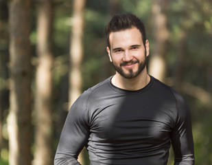 Portrait Of Male Runner in nature after jogging