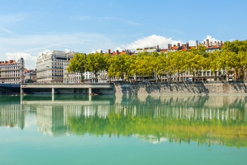 Cityscape of Lyon, France with reflections in the water