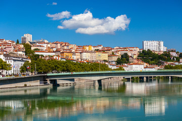 Fototapeta na wymiar Cityscape of Lyon, France with reflections in the water