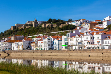 View of city Alcacer do Sal near the river Sado in Portugal