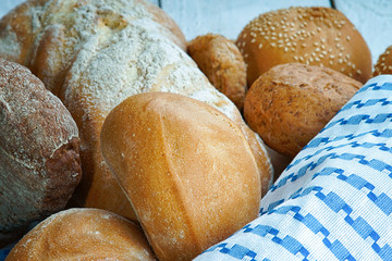 Assortment of bread and tablecloth