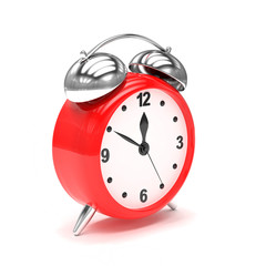 red alarm clock on white