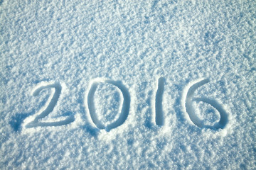 New Year's and Christmas background from snow.text on snow 2016