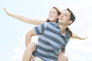 Fototapeta premium A couple outside having fun together outside