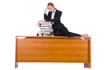 Woman with lots of paperwork isolated on white
