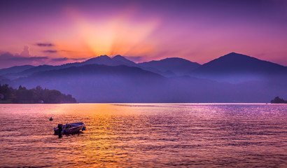 Beautiful summer sunset on the Orta lake, Italy