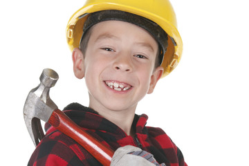 Young boy pretending to be a carpenter