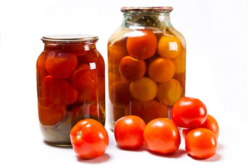 Fresh and canned red tomatoes on white background.
