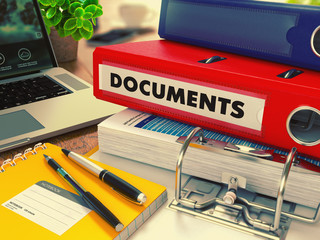 Red Office Folder with Inscription Documents.