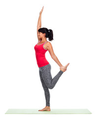 Fototapeta premium Young woman doing yoga.