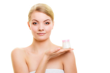 Obraz na płótnie Canvas Skin care. Girl applying moisturizing cream.