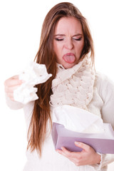 Sick woman girl with fever sneezing in tissue