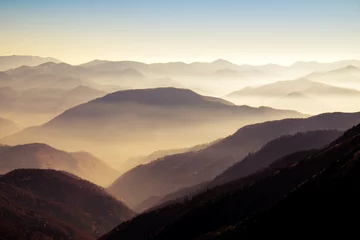 Fototapeten Scenic view of misty autumn hills and mountains in Slovakia © Martin M303