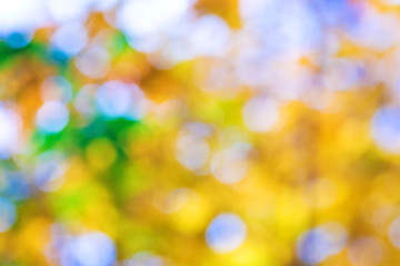 background in gold, green and blue colors