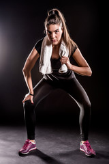 Fototapeta na wymiar Powerful Fitness Girl Stretching