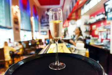 glass of champagne in cafe