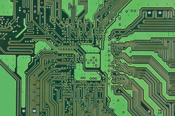 Close up of a printed green computer circuit board