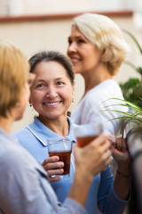 Woman friends on summer terrace