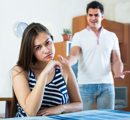 Angry spouses having domestic argue