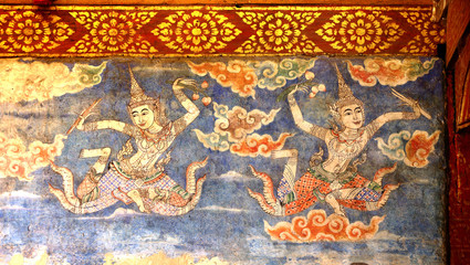 Fototapeta na wymiar Thai mural of angel flying in the sky to bless.