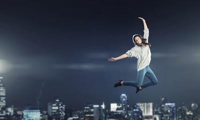 Obraz na płótnie Canvas Dancer girl in jump