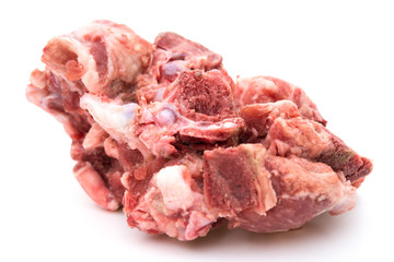 frozen chopped ribs on a white background close up