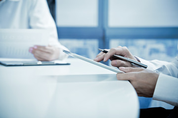 Obraz premium Businessman Using Digital Tablet In Office