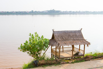 Fototapeta na wymiar Small hut near river