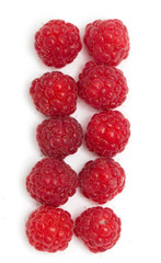 Fresh ripe raspberries on a white background
