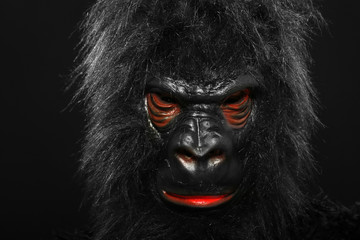 Portrait of a man with gorilla mask