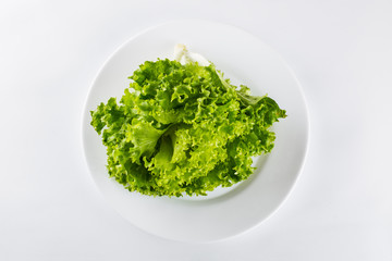 Heathy lifestyle, organic salad in a plates on white