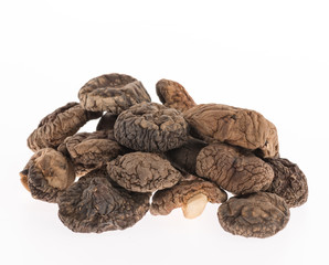 dried shiitake mushrooms on white background