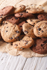 pile of homemade chocolate chips cookies closeup, vertical
