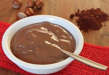 chocolate pudding - with hazelnut at christmastime on a wooden table