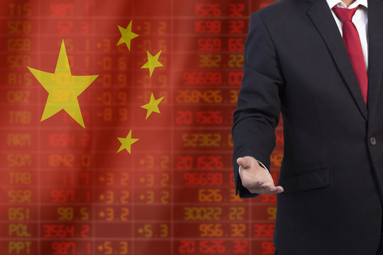 Flag of China. Downtrend stock data diagram with business man wi - Powered by Adobe