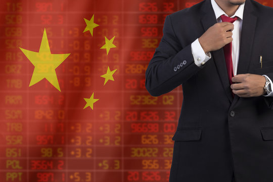 Flag of China. Downtrend stock data diagram with business man - Powered by Adobe
