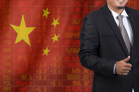 Flag of China. Downtrend stock data diagram with business man - Powered by Adobe