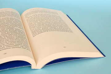 Book isolated on blue background