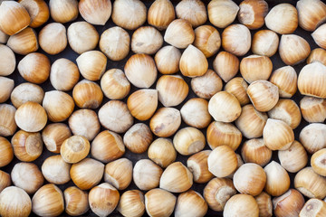 Nuts, hazelnuts as background. Healthy eating vegetarian nut food brown hazelnut.
