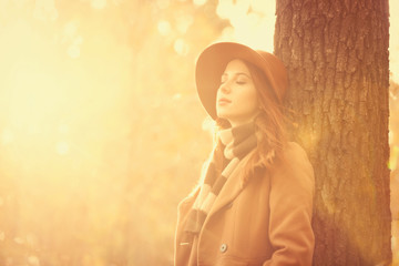 Woman in autumn park