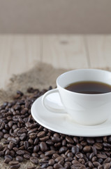 Coffee cup and coffee beans
