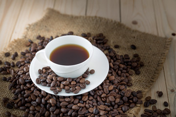 Coffee cup and saucer on a wooden table