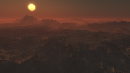 Sunset over misty remote rocky landscape.