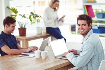 Creative businessteam working with mobile computers